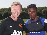 Welcome aboard: Manager David Moyes greets new signing Wilfried Zaha