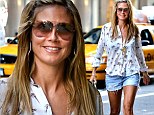 Missing the Bahamas already? Heidi Klum maintains a beachy theme as she steps out in NYC in a palm tree print shirt