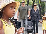 Sunny girl: Heidi Klum's daughter Lou wore a yellow sundress while out with her mother Heidi Klum and her bodyguard boyfriend Martin Kristen in New York