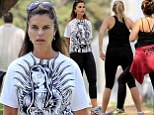 How virtuous! Maria Shriver wears a religious T-shirt while working out at the beach with her daughter 