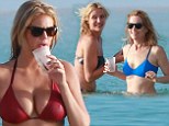 Work had, play hard: Kate Upton joined her cast mates Cameron Diaz and Leslie Mann for some fun at the beach in the Bahamas after filming The Other Woman on Friday