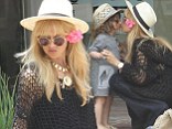 Picture perfect moment: Rachel Zoe received a kiss from her son Skyler as the two shopping in Malibu, California on Saturday
