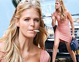 Ready? Erin Heatherton had a quick smoke in her elegant bandage dress before attended a Victoria's Secret event at New York's SoHo store on Tuesday