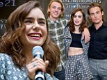 Lily Collins bares her toned midriff as she cosies up to beau Jamie Campbell Bower while promoting new film The Mortal Instruments: City Of Bones