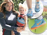 Matching footwear: Hilary Duff and young son Luca sported complementary trainers on Wednesday while out for a walk in West Hollywood, California