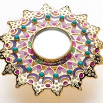 Designer Manish Arora captures the spirit of India in an enamel, crystal and mirror ring. £200, www.amrapalijewels.com