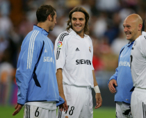 Jonathan Woodgate (centre) chats with Ivan Helguera (left) and Thomas Gravesen after a Santiago Bernabeu Trophy friendly soccer match between Real Madrid and a U.S. Major League Soccer all-star selection at the Bernabeu in Madrid, Spain.