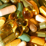 A general view of tablets and capsules. he fate of controversial new European laws which could outlaw thousands of vitamin and mineral supplements will be decided, Tuesday July 12, 2005. The rules, due in force in August, are designed to tighten controls on the growing market in products sold under the health food heading - natural remedies, vitamin supplements and mineral plant extracts. See PA story EU Vitamins. PRESS ASSOCIATION photo. Photo Credit should read: Fiona Hanson/PA