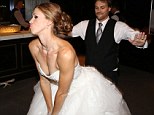 Getting down: At the reception, the former back-up dancer showed off some of his signature dance moves with his new bride 