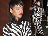 She's a wild one: Rihanna steps out in full length zebra print dress for a night out in the Big Apple