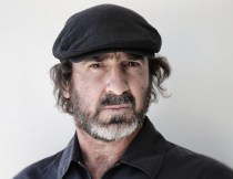 CANNES, FRANCE - MAY 20:  (EDITORS NOTE: This image was processed using digital filters) Eric Cantona poses during 'Les Recontres D'Apres Minuit' Portrait Session as part of the 66th Annual Cannes Film Festival at Nespresso Beach on May 20, 2013 in Cannes, France.  (Photo by Vittorio Zunino Celotto/Getty Images)
