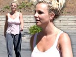 Baby, one more time: Britney Spears sweats it out at an LA dance studio in grubby tracksuit near identical to the previous day's