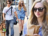 Amanda Seyfried shows off shapely legs in Daisy Dukes as she takes her 'leading man' Finn for walkies (oh, and her boyfriend Justin Long too)
