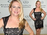 Sexy mama! Melissa Joan Hart puts her svelte figure on display in lacy black dress at Strut: The Fashionable Mom Show