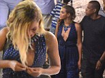 Beyonc narrowly avoids a wardrobe malfunction as a button on her low-cut jumpsuit pops open at dinner with Jay Z