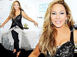 One outfit, two events: Adrienne Maloof gets her money's worth from unusual frock as she hits two parties in layered tulle number