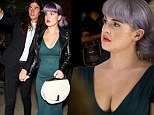 Shine bright like an emerald! Kelly Osbourne highlights her hourglass curves in green dress as she's joined by fianc Matthew for Zac Posen NYFW show