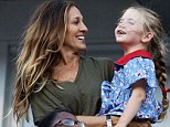 Funny girl: Sarah Jessica Parker's daughter Marion kept her laughing and smiling during the US Open final in New York on Sunday