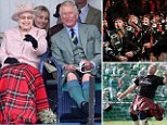 Prince Philip, Duke of Edinburgh, Queen Ellizabeth and Prince Charles, Prince of Wales laugh as they watch the sack race during the annual Braemer Highland Games