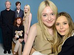 Dakota Fanning cosies up to pal Elizabeth Olsen before joining the cast of The Last Of Robin Hood for their official TIFF portrait