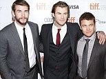 Brotherly love: Luke Hemsworth (far right) joined his superstar younger brothers Liam (left) and Chris (centre) at the Toronto premiere of Chris's new film Rush on Sunday night 