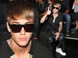 The Bieber is back! Justin returns to his roots with youthful haircut as he takes front row seat at Y-3 Fashion Week show