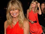 You can't miss her! Goldie Hawn makes sure to brighten everyone's day at the Donna Karan runway show