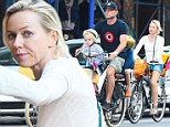 Back to wheel life! Naomi Watts embraces family time as she pedals around the city with Liev Schreiber and their boys