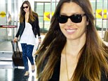 You can call me Mrs. Timberlake now! Beaming Jessica Biel jets out in a chic ensemble as she 'legally takes her husband Justin's surname'