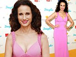 What's in a rose? Andie MacDowell allures in a plunging pink gown to attend charity event in Berlin