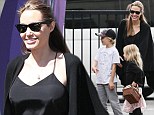 Girls' day out! Angelina Jolie sports chic all-black ensemble as she steps out with daughters Shiloh and Vivienne in Sydney 