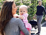 Playing happy families: Jeremy Renner and ex-girlfriend Sonni Pacheco enjoy an amicable outing with precious daughter Ava