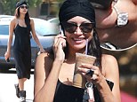 What this old thing? Newly engaged Naya Rivera shows off her massive diamond ring like it is no big deal as she grabs a coffee