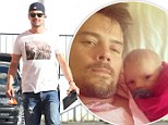 Father-son tradition starts now! Doting new dad Josh Duhamel shares snuggly snap of he and baby Axl watching football together