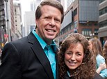 Proud parents: Mother-of-19 Michelle Duggar has revealed that she and her husband Jim Bob are trying for another baby as their fiftieth birthdays come closer 