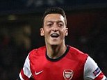 Account open: Ozil scored his first Arsenal goal in the Champions League win over Napoli 