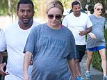 Almost time for a new Fresh Prince (or princess): Alfonso Ribeiro and his heavily pregnant wife enjoy a stroll ahead of the birth of their first child together