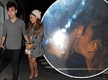 Young love! Ariana Grande plants a kiss on boyfriend Nathan Sykes cheek as they enjoy a romantic dinner in London 