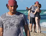 Robert Rodriguez, films himself and his girlfriend kissing on his iphone in Miami Beach