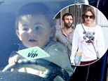 What were you thinking? Alessandra Ambrosio's fiance Jamie Mazur drives down street with their 17-month-old son on his lap