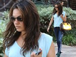 The moody hues...Downcast Mila Kunis wears three shades of blue for a day out with friends 