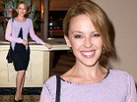 Single and ready to mingle! Kylie Minogue puts on a brave face as she steps out for the first time after split from Andres Velencoso 