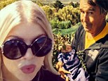 'Grampa's favourite bundle!' Fergie's dad Pat cradles baby Axl Jack while she picks grapes with Josh Duhamel at the family vineyard