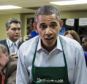 Hard to swallow: Republicans will be angered by the bold demand from the Democrats after Obama, pictured at a foodbank in D.C. today. has for the last month said he would not pay a 'ransom'