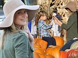 Say boo! Ali Larter makes memories as she snaps her son Teddy perching on a pumpkin as they head to celebrity favourite Mr. Bones Patch 
