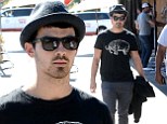 Joe Jonas steps out for lunch amid rumours that his 'secret drug addiction' was the 'real reason' for cancelling the Jonas Brothers' tour