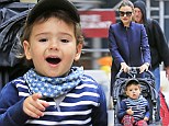 Stars and stripes! Miranda Kerr dresses her son Flynn in a snappy mix of prints as she teaches him the art of window shopping on swanky Madison Avenue