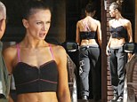 It sure pays off! Professional dancer Karina Smirnoff shows off her impeccable abs in a tiny crop top at DWTS rehearsals