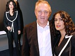 Parisian chic! Salma Hayek dons stylish black and white Alexander McQueen suit at photography exhibition in her adopted homeland