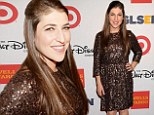 Mayim Bialik smiles at Respect awards... as it emerges she is suing over crash that 'nearly cost her hand'